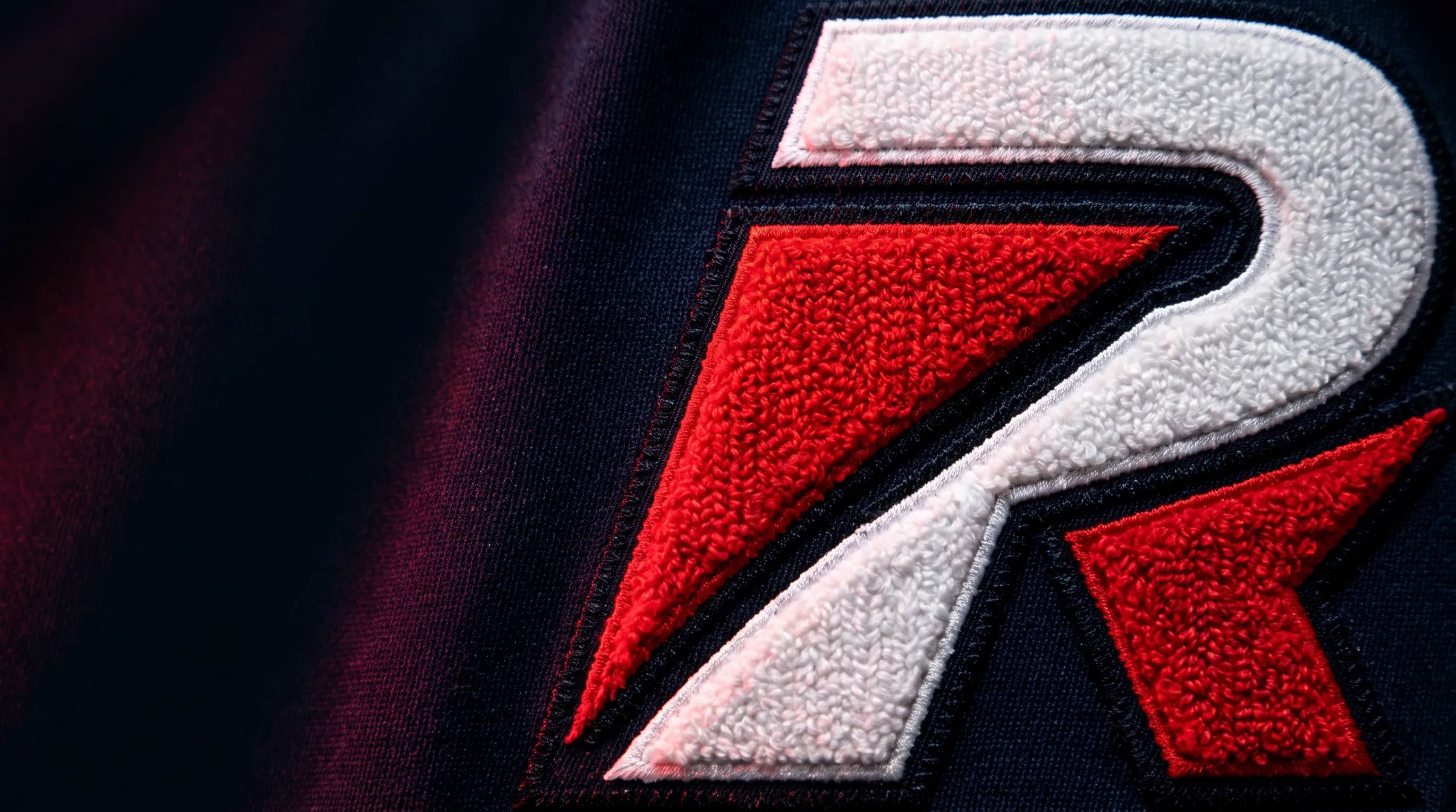 Tackle twill & chenille garments in a players' tunnel