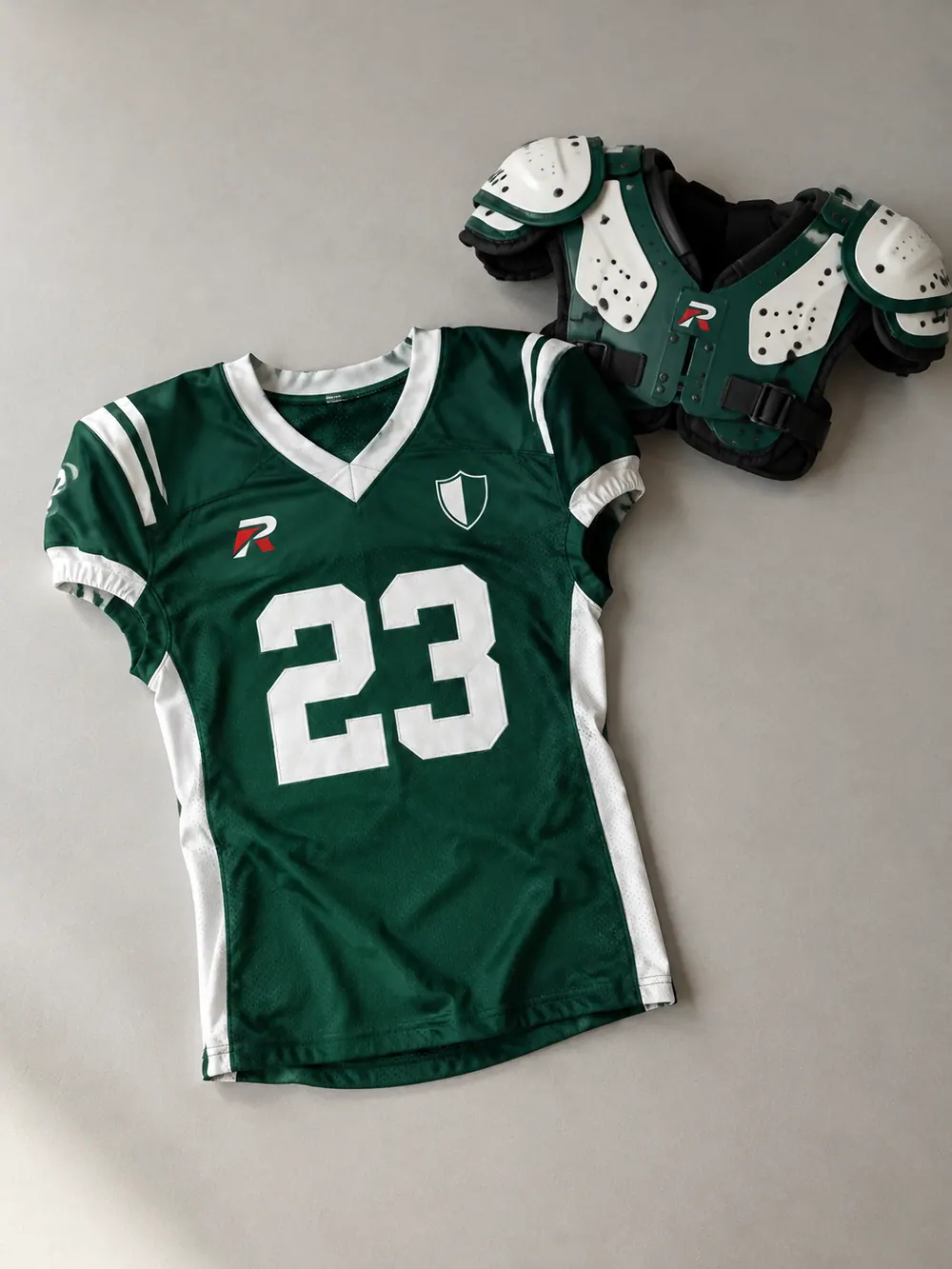 Forest green/white game jersey with shoulder pads, front