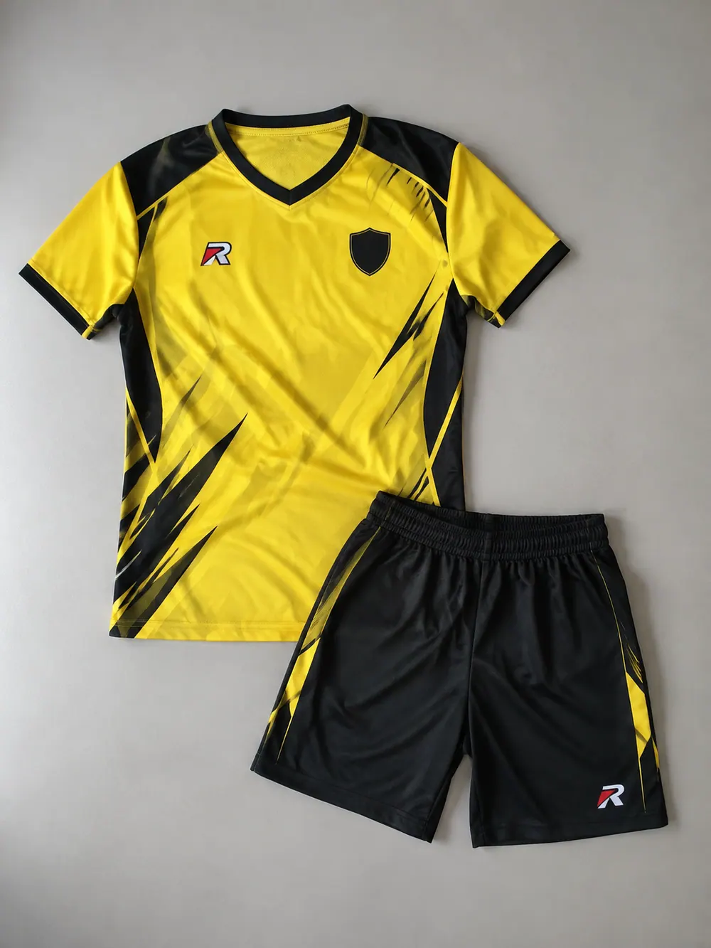 Yellow/black shirt and shorts