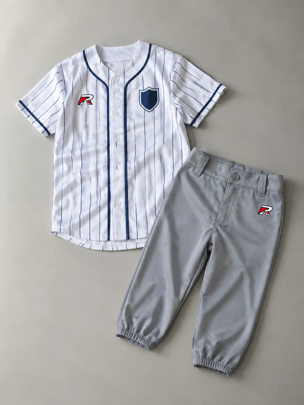 Youth uniform with knicker-length pants, flat lay