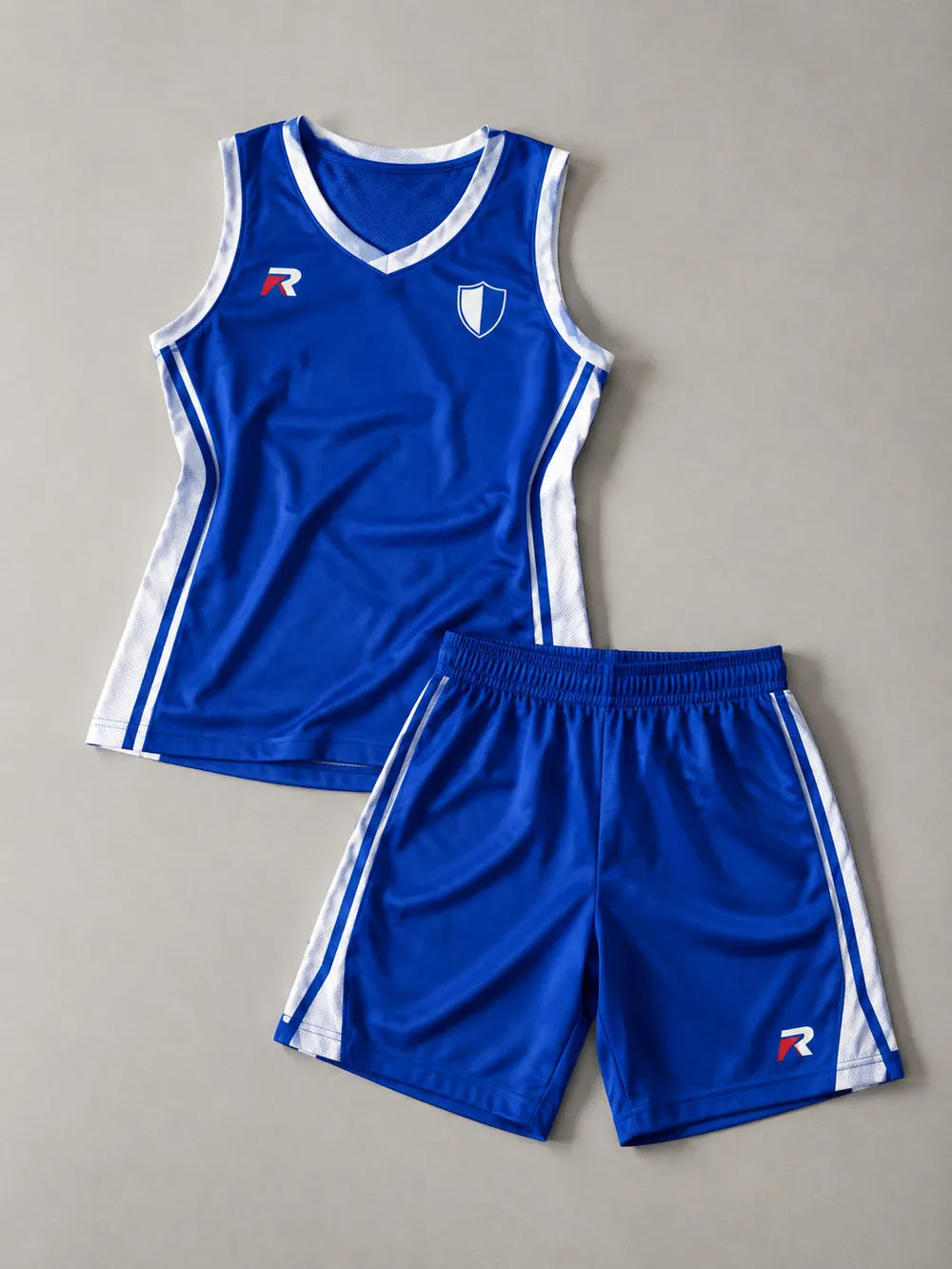 Royal blue women’s cut uniform, flat lay