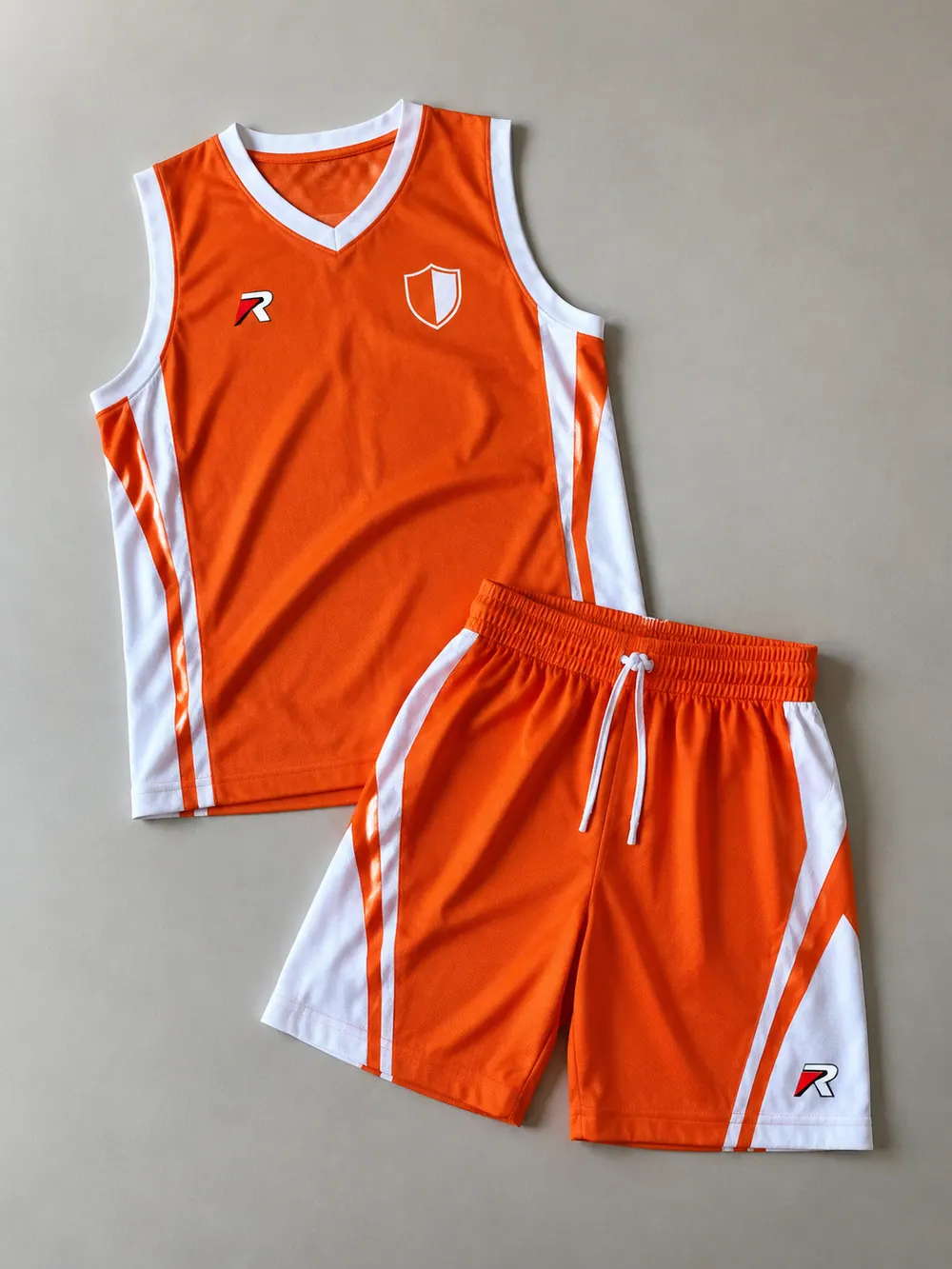 Youth uniform in orange and white, flat lay