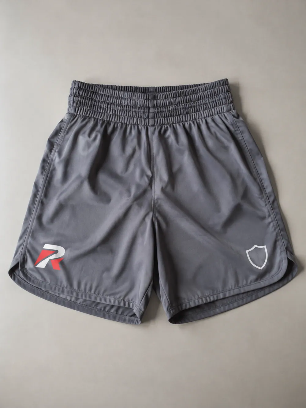 Training shorts in grey, flat lay