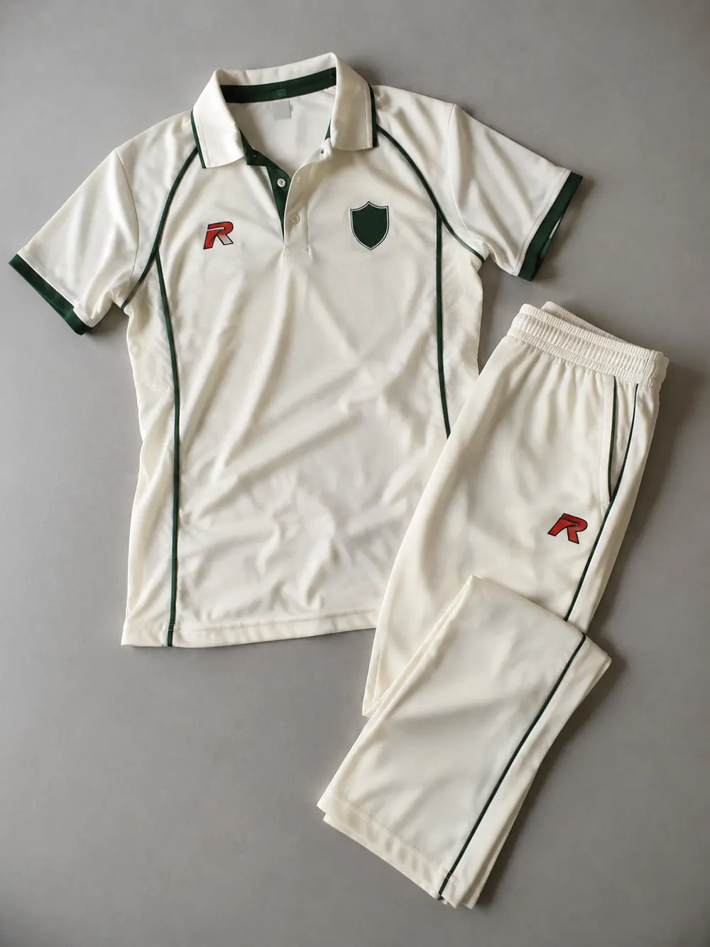 Cream whites shirt and trousers with green trim