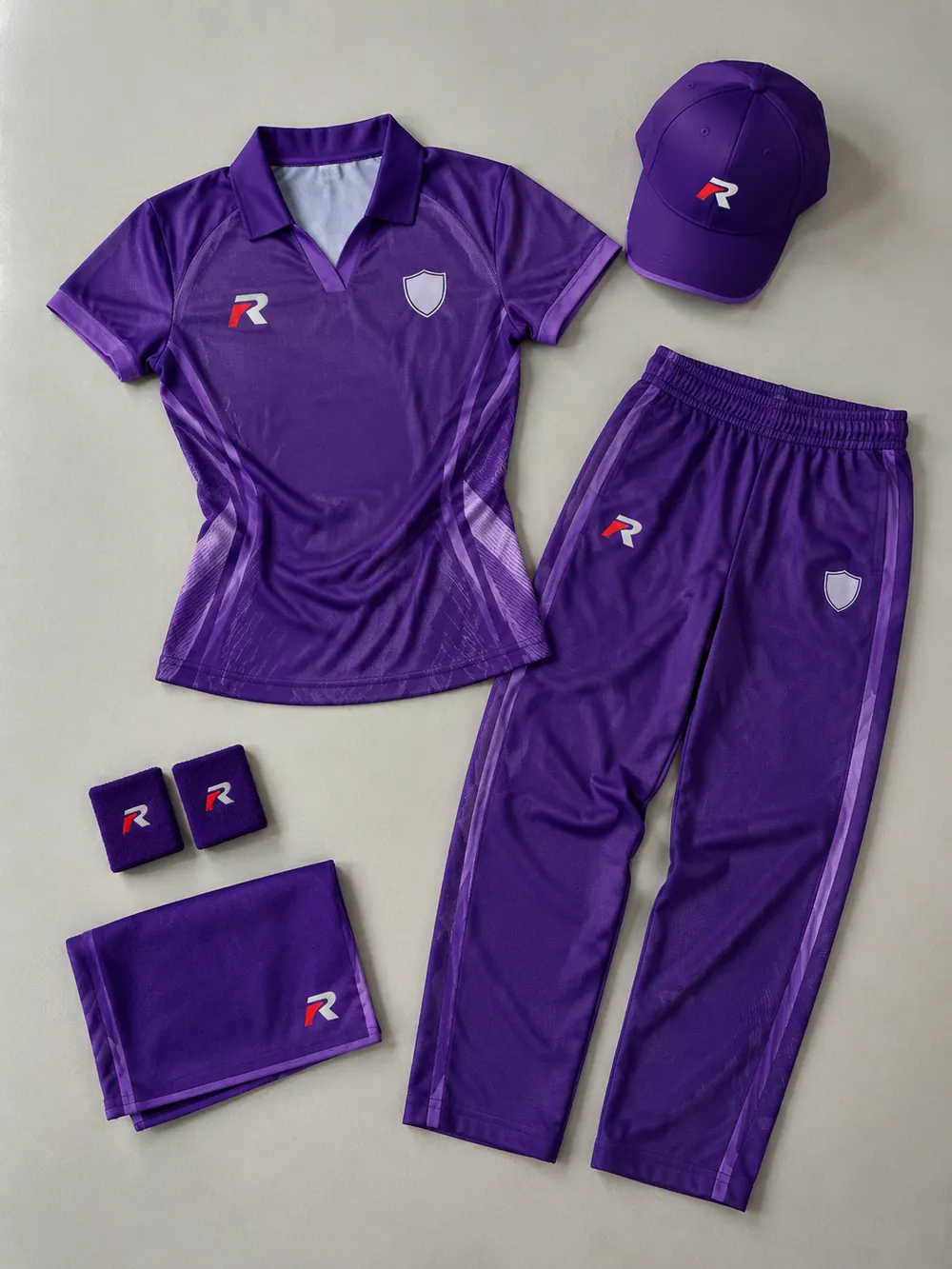 Women’s T20 kit in purple, flat lay