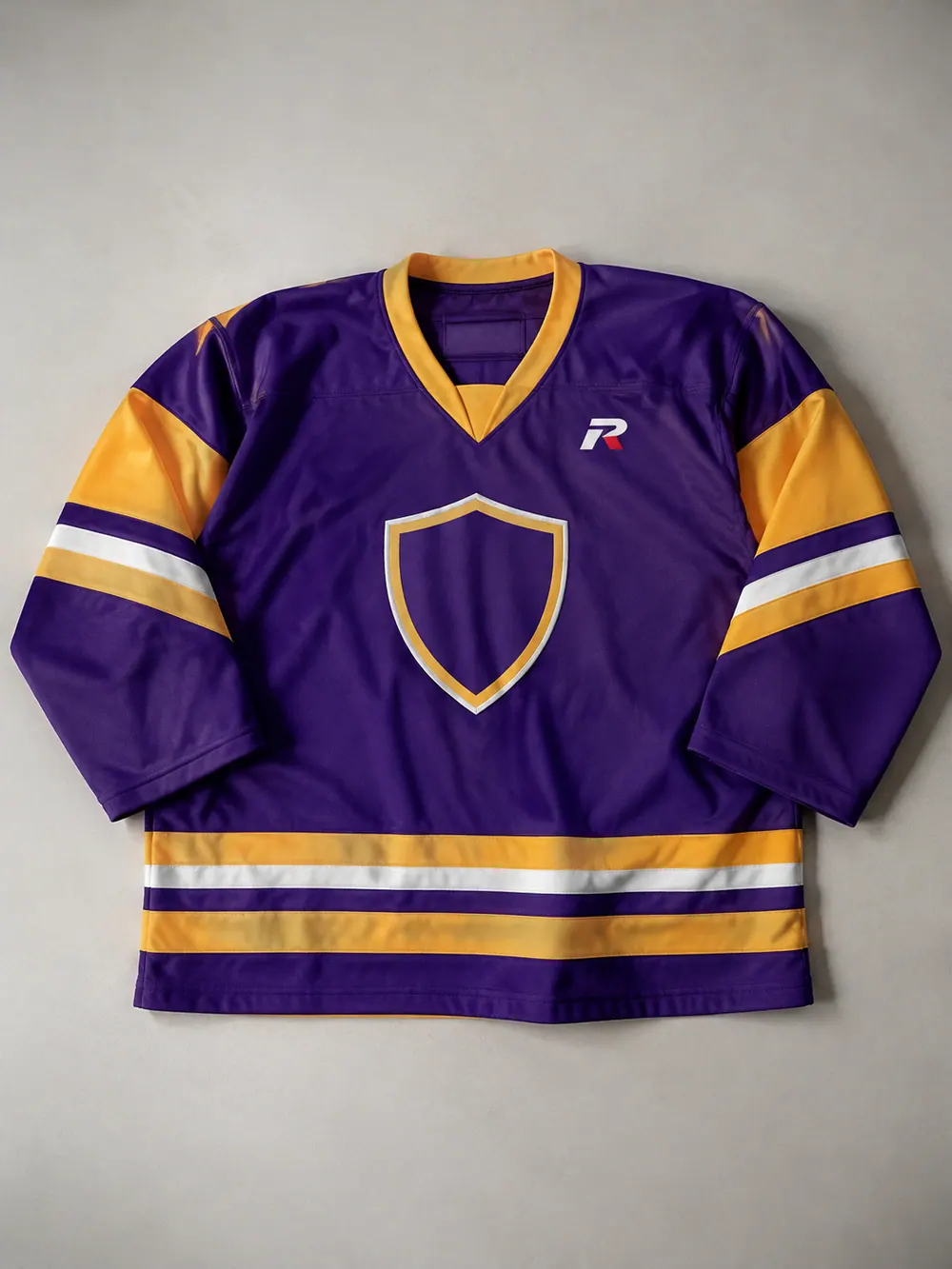 Goalie cut jersey (wider body), flat lay