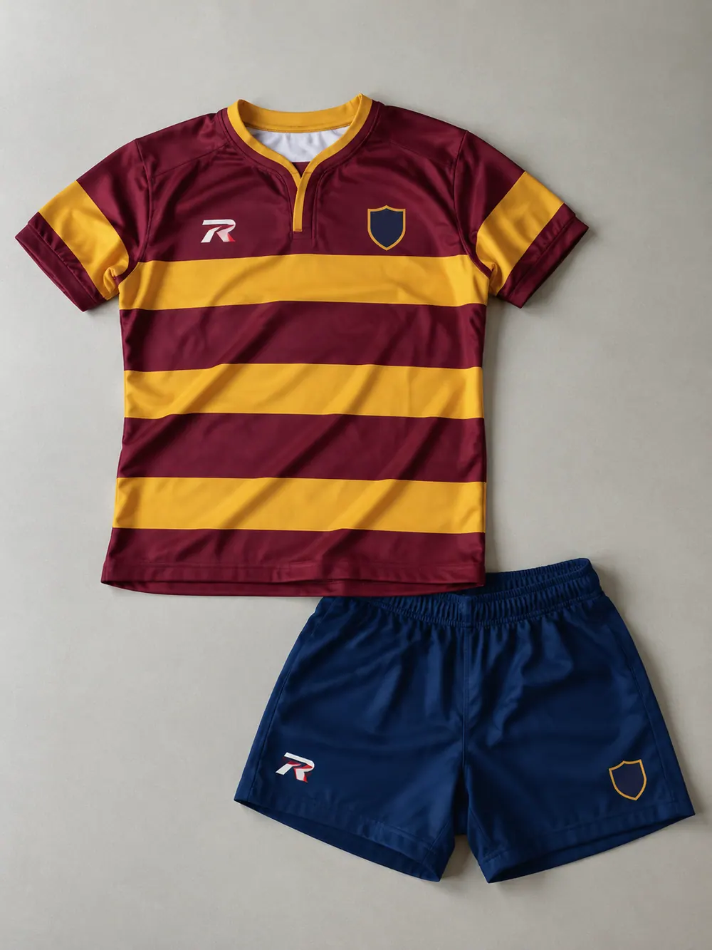 Maroon/gold hooped jersey and navy shorts