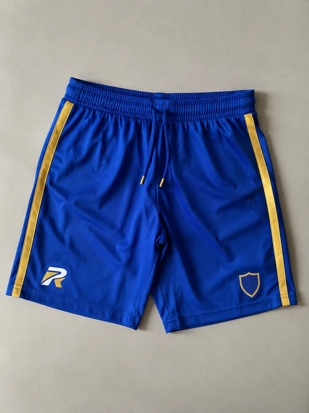 Screen printing on shorts / waistband, flat lay