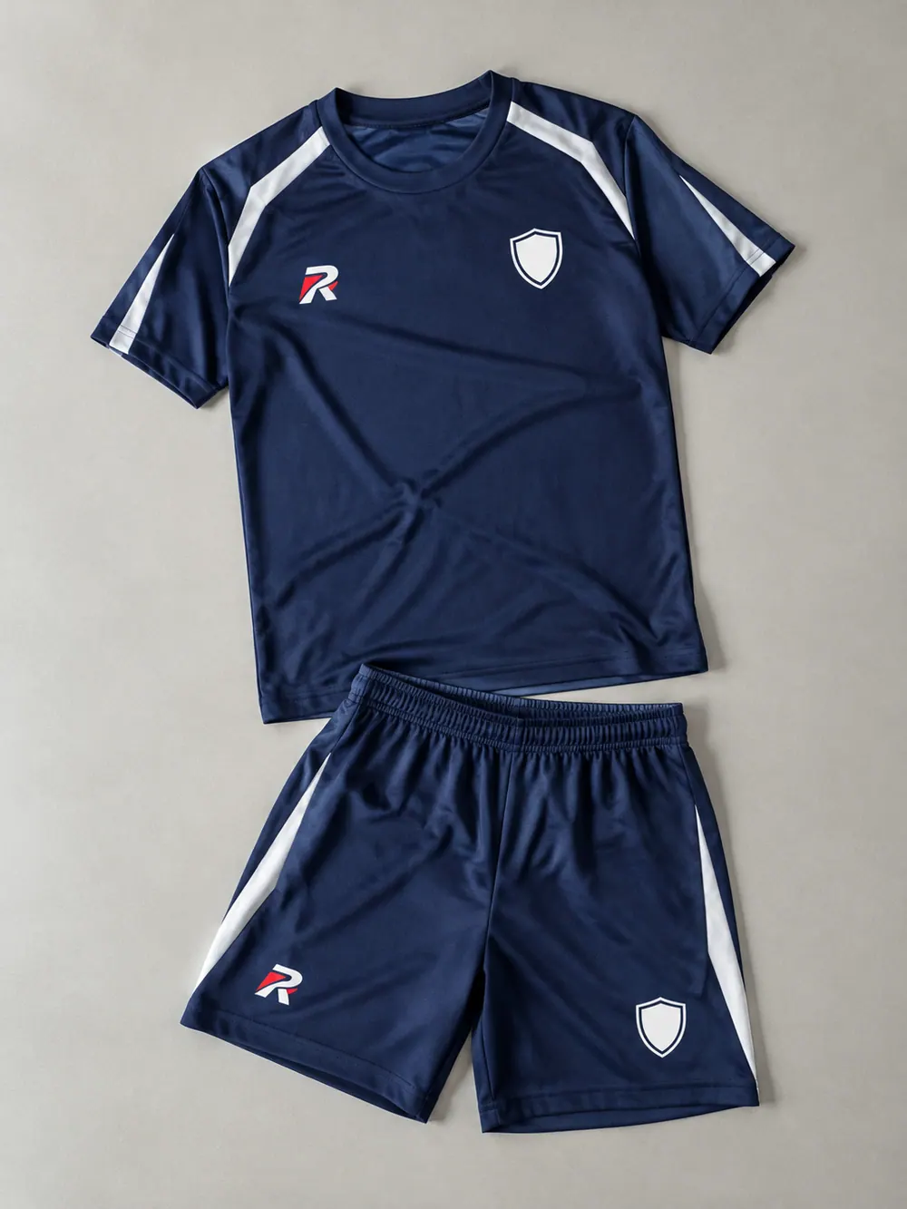 Navy training top and shorts, flat lay