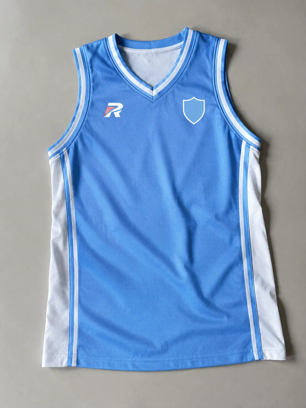 Special finishes on a basketball singlet, flat lay