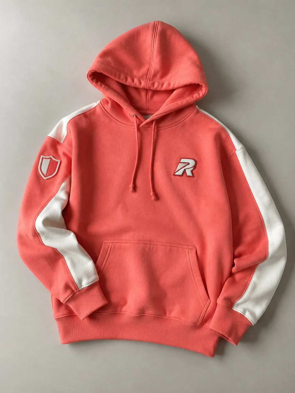 Woven labels & patches on a hoodie, flat lay