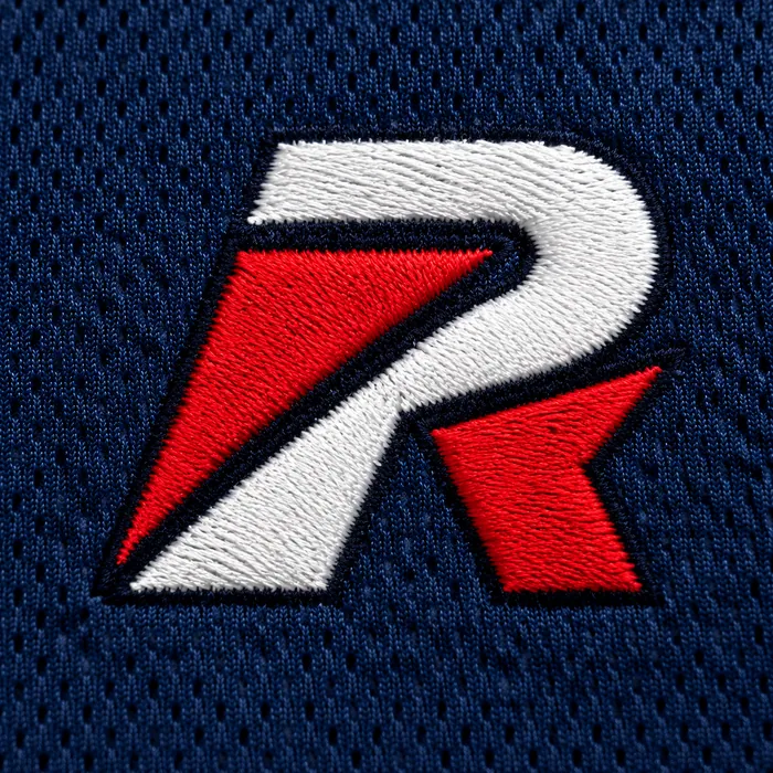 The R crest embroidered on navy knit